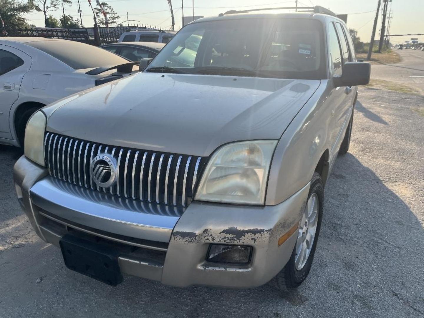 2006 BROWN MERCURY MOUNTAINEER Convenience 4.0L 2WD (4M2EU36EX6U) with an 4.0L V6 SOHC 12V engine, AUTOMATIC transmission, located at 2303 West Mt. Houston, Houston, Texas, 77038, (281) 507-3956, 29.771597, -95.339569 - Photo#0