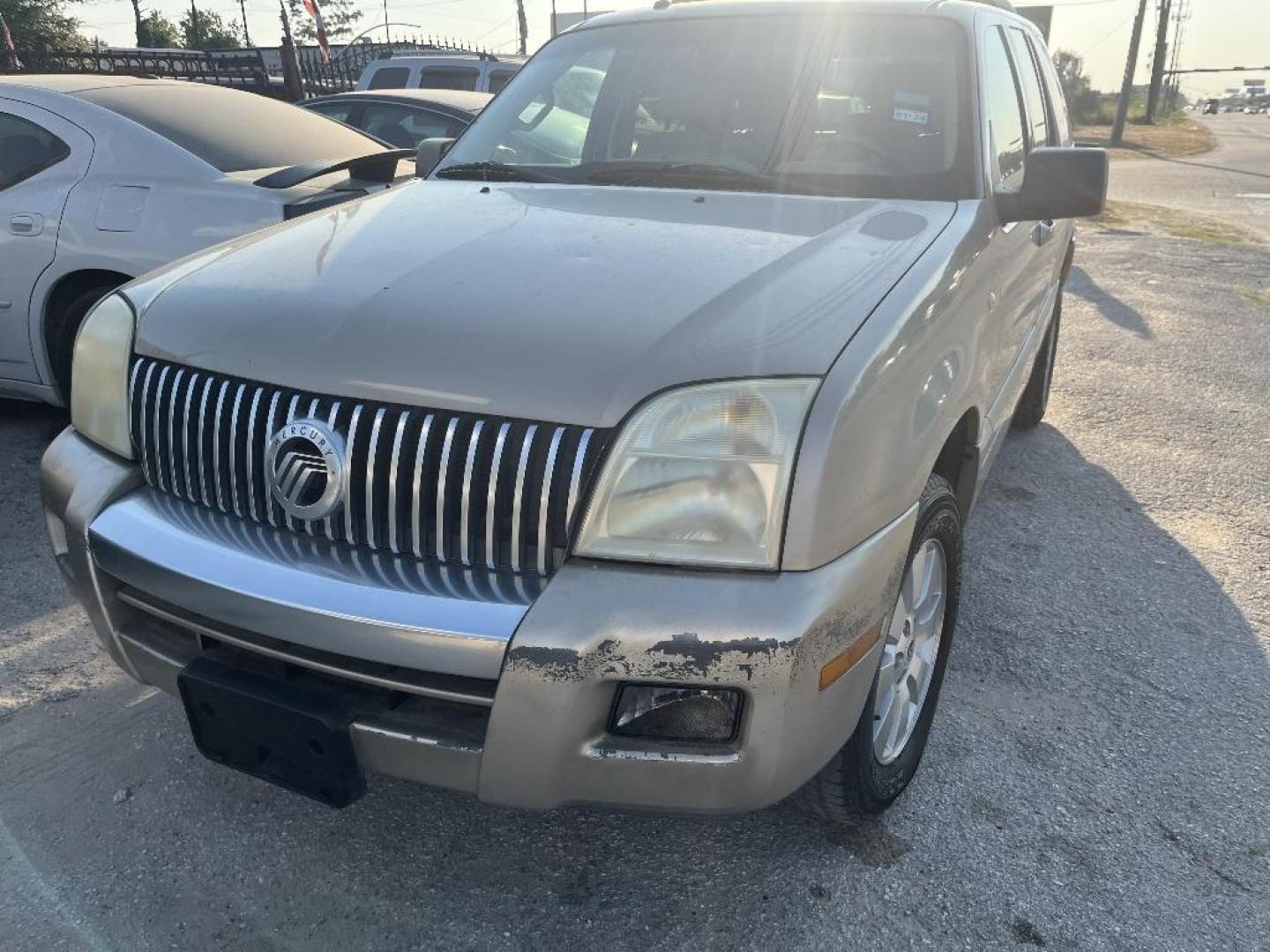 2006 BROWN MERCURY MOUNTAINEER Convenience 4.0L 2WD (4M2EU36EX6U) with an 4.0L V6 SOHC 12V engine, AUTOMATIC transmission, located at 2303 West Mt. Houston, Houston, Texas, 77038, (281) 507-3956, 29.771597, -95.339569 - Photo#4