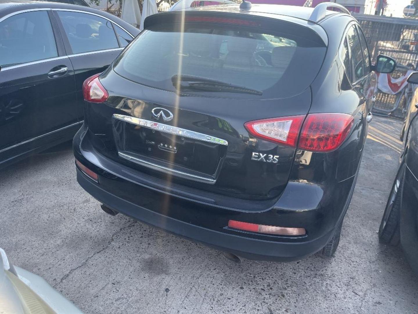 2010 BLACK INFINITI EX EX35 (JN1AJ0HPXAM) with an 3.5L V6 DOHC 24V engine, AUTOMATIC transmission, located at 2303 West Mt. Houston, Houston, Texas, 77038, (281) 507-3956, 29.771597, -95.339569 - Photo#4