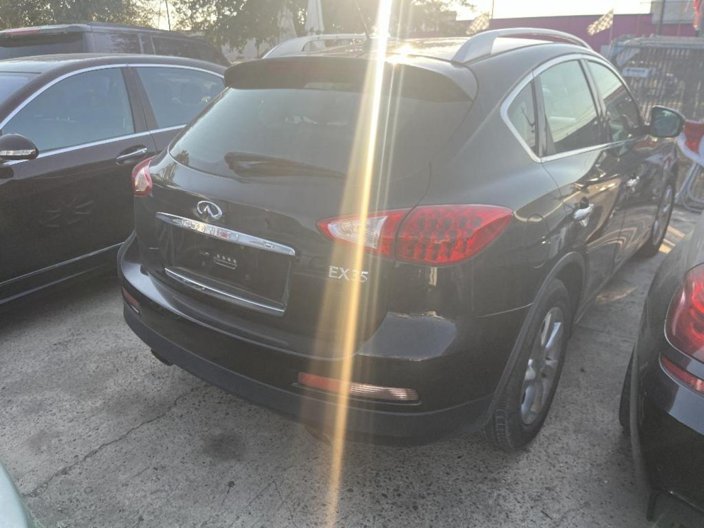 2010 BLACK INFINITI EX EX35 (JN1AJ0HPXAM) with an 3.5L V6 DOHC 24V engine, AUTOMATIC transmission, located at 2303 West Mt. Houston, Houston, Texas, 77038, (281) 507-3956, 29.771597, -95.339569 - Photo#5