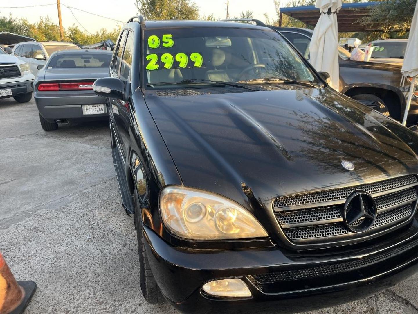 2005 BLACK MERCEDES-BENZ M-CLASS ML350 (4JGAB57E55A) with an 3.7L V6 SOHC 18V engine, AUTOMATIC transmission, located at 2303 West Mt. Houston, Houston, Texas, 77038, (281) 507-3956, 29.771597, -95.339569 - Photo#0