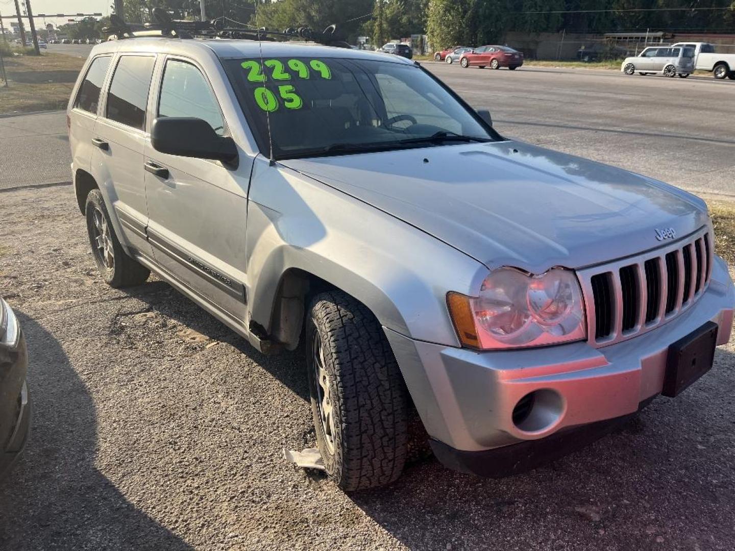 2005 GRAY JEEP GRAND CHEROKEE Laredo 4WD (1J4GR48K75C) with an 3.7L V6 SOHC 12V engine, AUTOMATIC transmission, located at 2303 West Mt. Houston, Houston, Texas, 77038, (281) 507-3956, 29.771597, -95.339569 - Photo#0