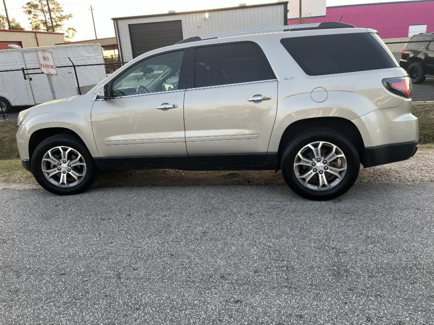 2015 BROWN GMC ACADIA SLT-2 FWD (1GKKRSKD3FJ) with an 3.6L V6 DOHC 24V engine, AUTOMATIC transmission, located at 2303 West Mt. Houston, Houston, Texas, 77038, (281) 507-3956, 29.771597, -95.339569 - Photo#0