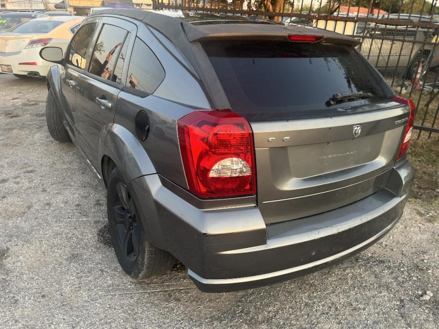 2011 GRAY DODGE CALIBER Mainstreet (1B3CB3HA0BD) with an 2.0L L4 DOHC 16V engine, AUTOMATIC transmission, located at 2303 West Mt. Houston, Houston, Texas, 77038, (281) 507-3956, 29.771597, -95.339569 - Photo#2