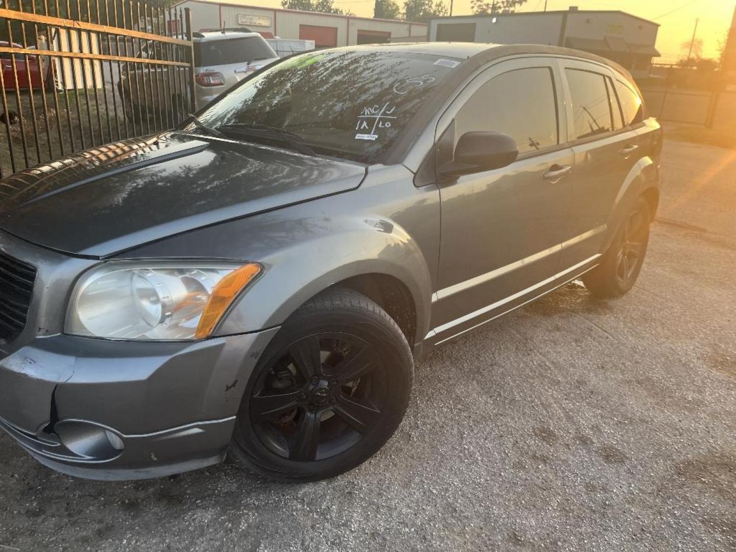 2011 GRAY DODGE CALIBER Mainstreet (1B3CB3HA0BD) with an 2.0L L4 DOHC 16V engine, AUTOMATIC transmission, located at 2303 West Mt. Houston, Houston, Texas, 77038, (281) 507-3956, 29.771597, -95.339569 - Photo#5