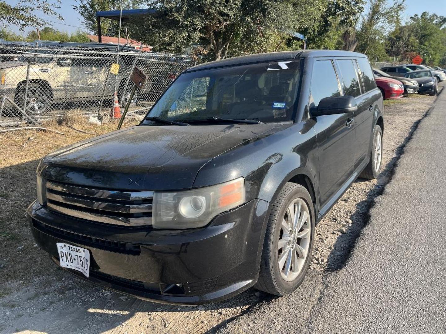 2011 BLACK FORD FLEX Limited FWD (2FMGK5DC8BB) with an 3.5L V6 DOHC 24V engine, AUTOMATIC transmission, located at 2303 West Mt. Houston, Houston, Texas, 77038, (281) 507-3956, 29.771597, -95.339569 - Photo#0