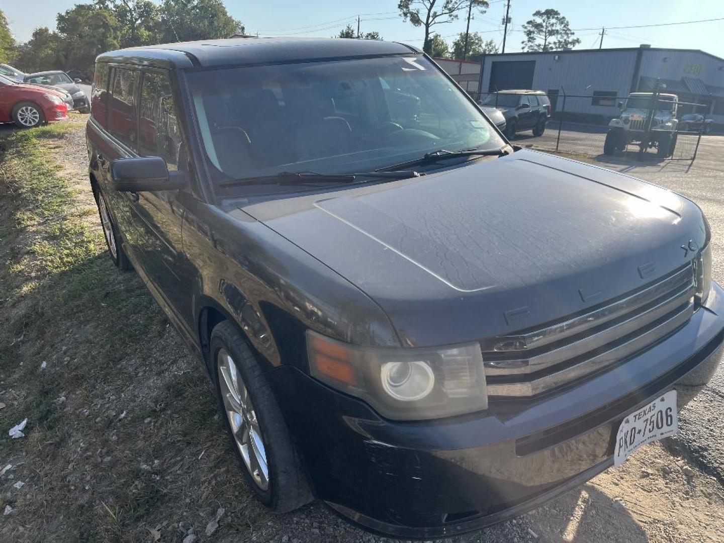 2011 BLACK FORD FLEX Limited FWD (2FMGK5DC8BB) with an 3.5L V6 DOHC 24V engine, AUTOMATIC transmission, located at 2303 West Mt. Houston, Houston, Texas, 77038, (281) 507-3956, 29.771597, -95.339569 - Photo#1