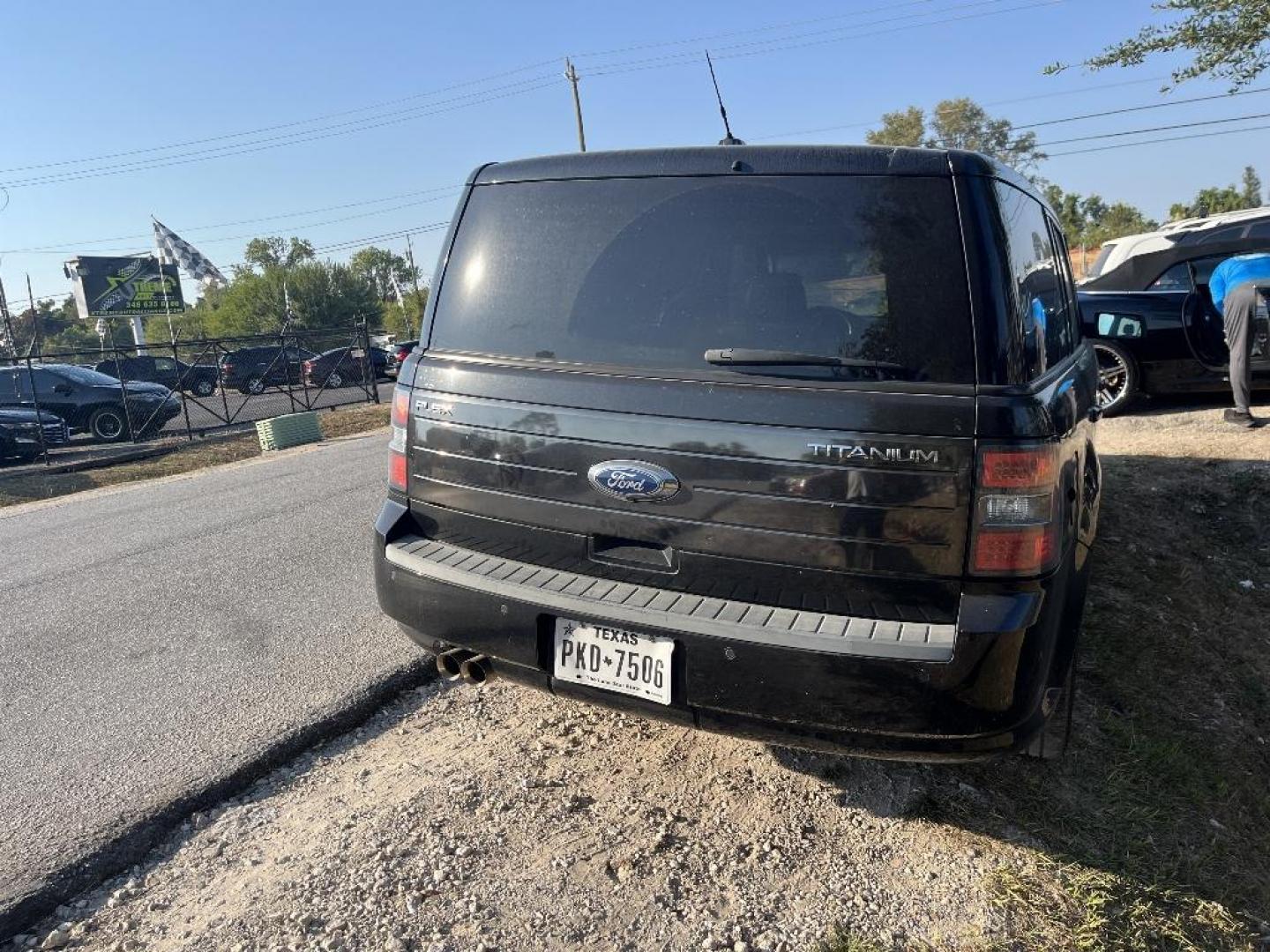 2011 BLACK FORD FLEX Limited FWD (2FMGK5DC8BB) with an 3.5L V6 DOHC 24V engine, AUTOMATIC transmission, located at 2303 West Mt. Houston, Houston, Texas, 77038, (281) 507-3956, 29.771597, -95.339569 - Photo#3