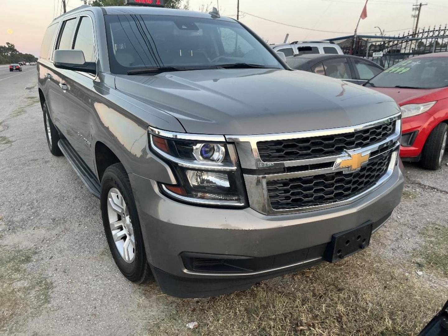 2017 TAN CHEVROLET SUBURBAN LT 2WD (1GNSCHKC4HR) with an 5.3L V8 OHV 16V engine, AUTOMATIC transmission, located at 2303 West Mt. Houston, Houston, Texas, 77038, (281) 507-3956, 29.771597, -95.339569 - Photo#0