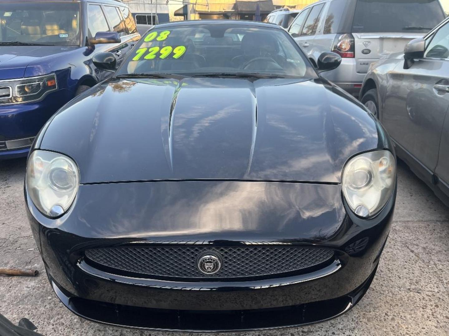 2008 BLACK JAGUAR XK-SERIES XK Convertible (SAJWA44B385) with an 4.2L V8 DOHC 32V engine, AUTOMATIC transmission, located at 2303 West Mt. Houston, Houston, Texas, 77038, (281) 507-3956, 29.771597, -95.339569 - Photo#0