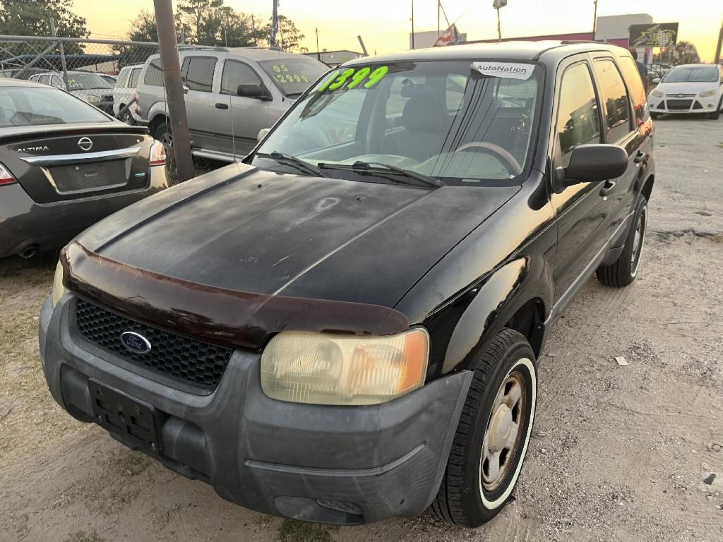 2004 BLACK FORD ESCAPE XLS 2WD (1FMYU02194K) with an 3.0L V6 DOHC 24V engine, AUTOMATIC transmission, located at 2303 West Mt. Houston, Houston, 77038, (281) 507-3956, 29.771597, -95.339569 - Photo#0