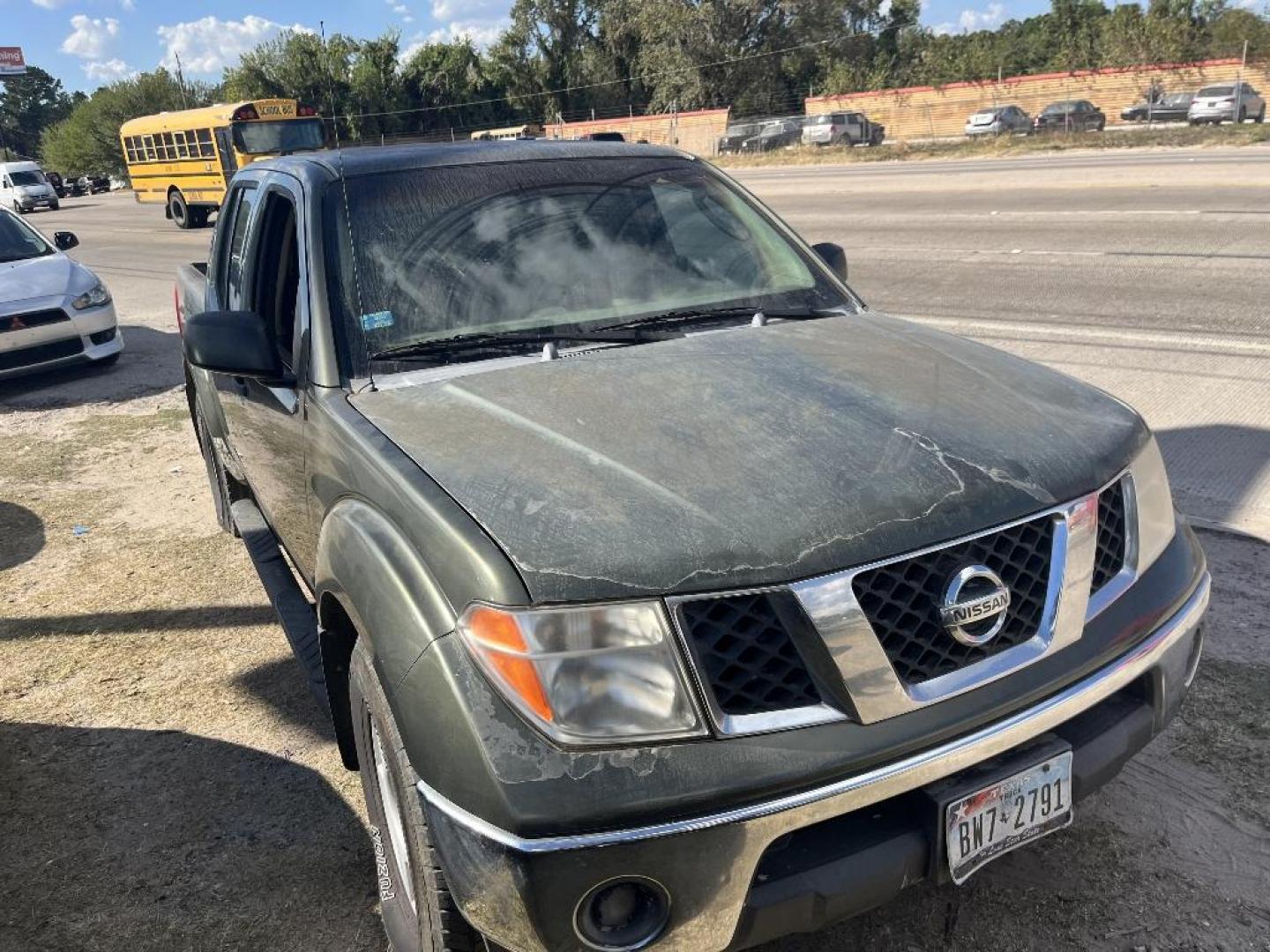 2005 BROWN NISSAN FRONTIER SE Crew Cab 2WD (1N6AD07U25C) with an 4.0L V6 DOHC 24V engine, AUTOMATIC transmission, located at 2303 West Mt. Houston, Houston, 77038, (281) 507-3956, 29.771597, -95.339569 - Photo#0