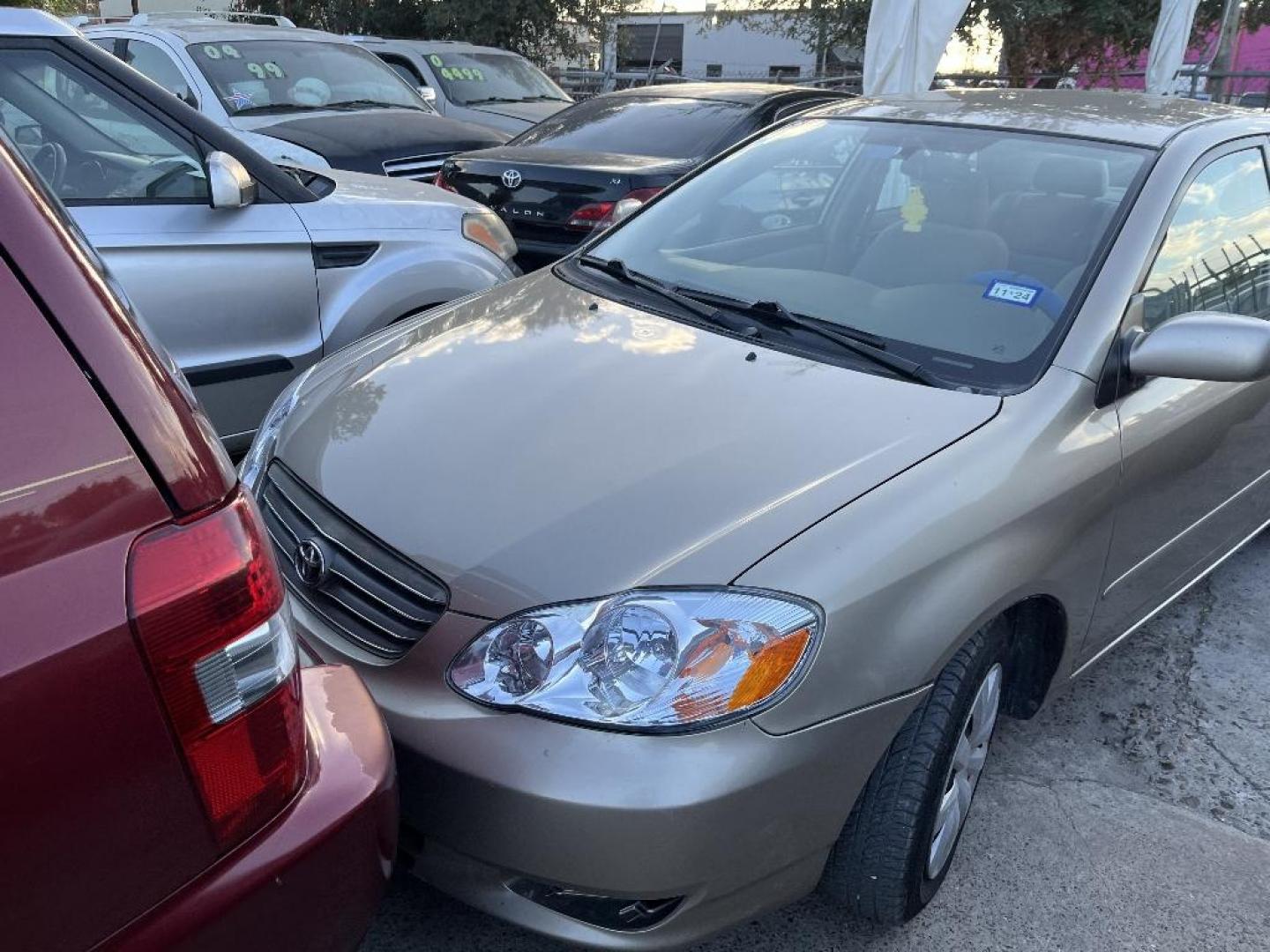 2004 BROWN TOYOTA COROLLA CE (1NXBR32E04Z) with an 1.8L L4 DOHC 16V engine, AUTOMATIC transmission, located at 2303 West Mt. Houston, Houston, 77038, (281) 507-3956, 29.771597, -95.339569 - Photo#0