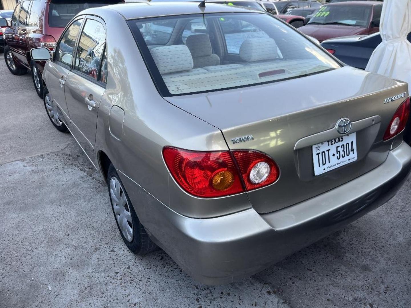 2004 BROWN TOYOTA COROLLA CE (1NXBR32E04Z) with an 1.8L L4 DOHC 16V engine, AUTOMATIC transmission, located at 2303 West Mt. Houston, Houston, 77038, (281) 507-3956, 29.771597, -95.339569 - Photo#3