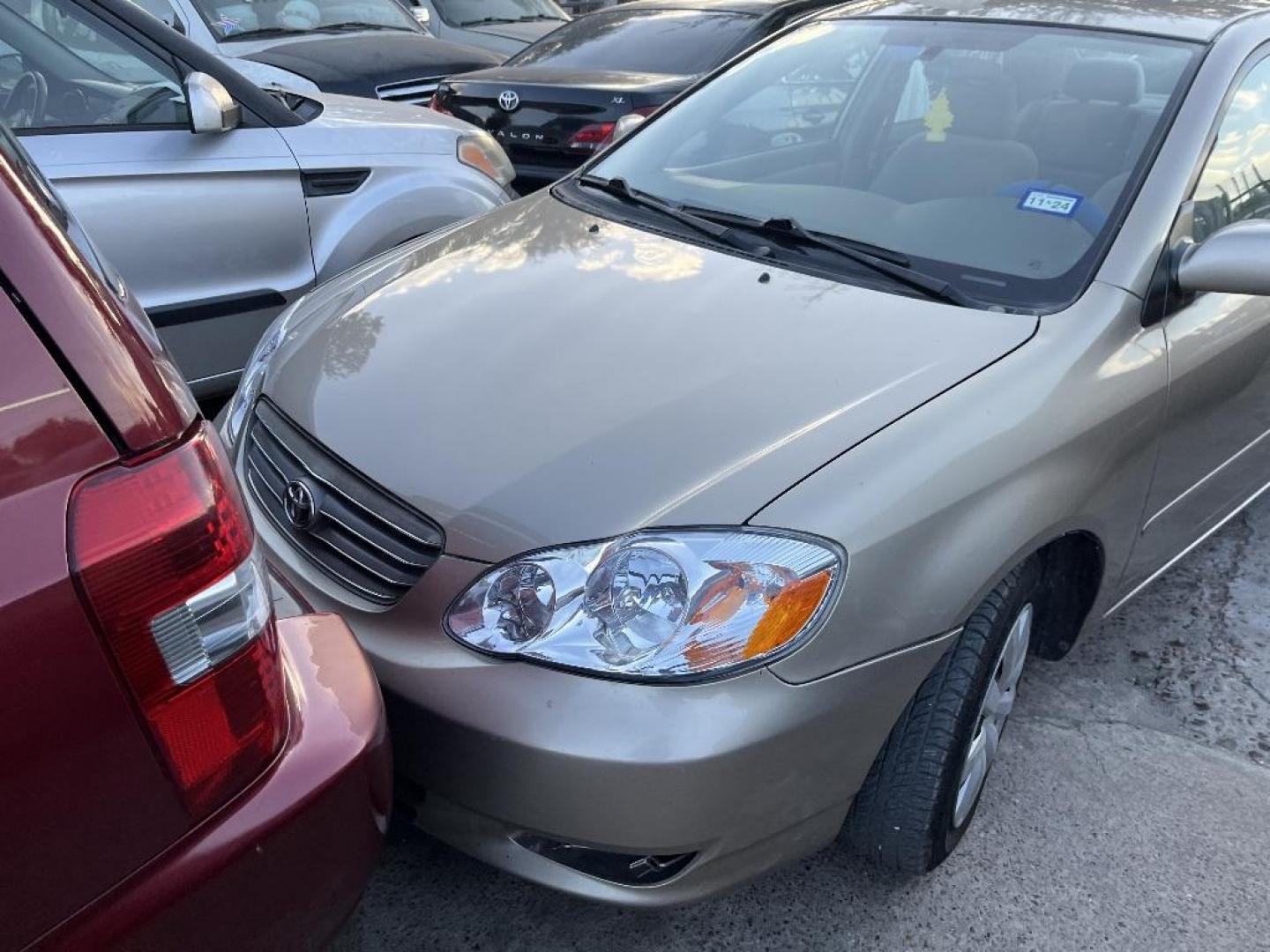 2004 BROWN TOYOTA COROLLA CE (1NXBR32E04Z) with an 1.8L L4 DOHC 16V engine, AUTOMATIC transmission, located at 2303 West Mt. Houston, Houston, 77038, (281) 507-3956, 29.771597, -95.339569 - Photo#5