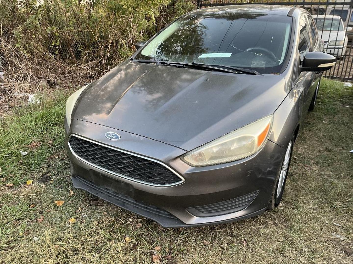 2017 BLACK FORD FOCUS SE Hatch (1FADP3K22HL) with an 2.0L L4 DOHC 16V engine, AUTOMATIC transmission, located at 2303 West Mt. Houston, Houston, 77038, (281) 507-3956, 29.771597, -95.339569 - Photo#0