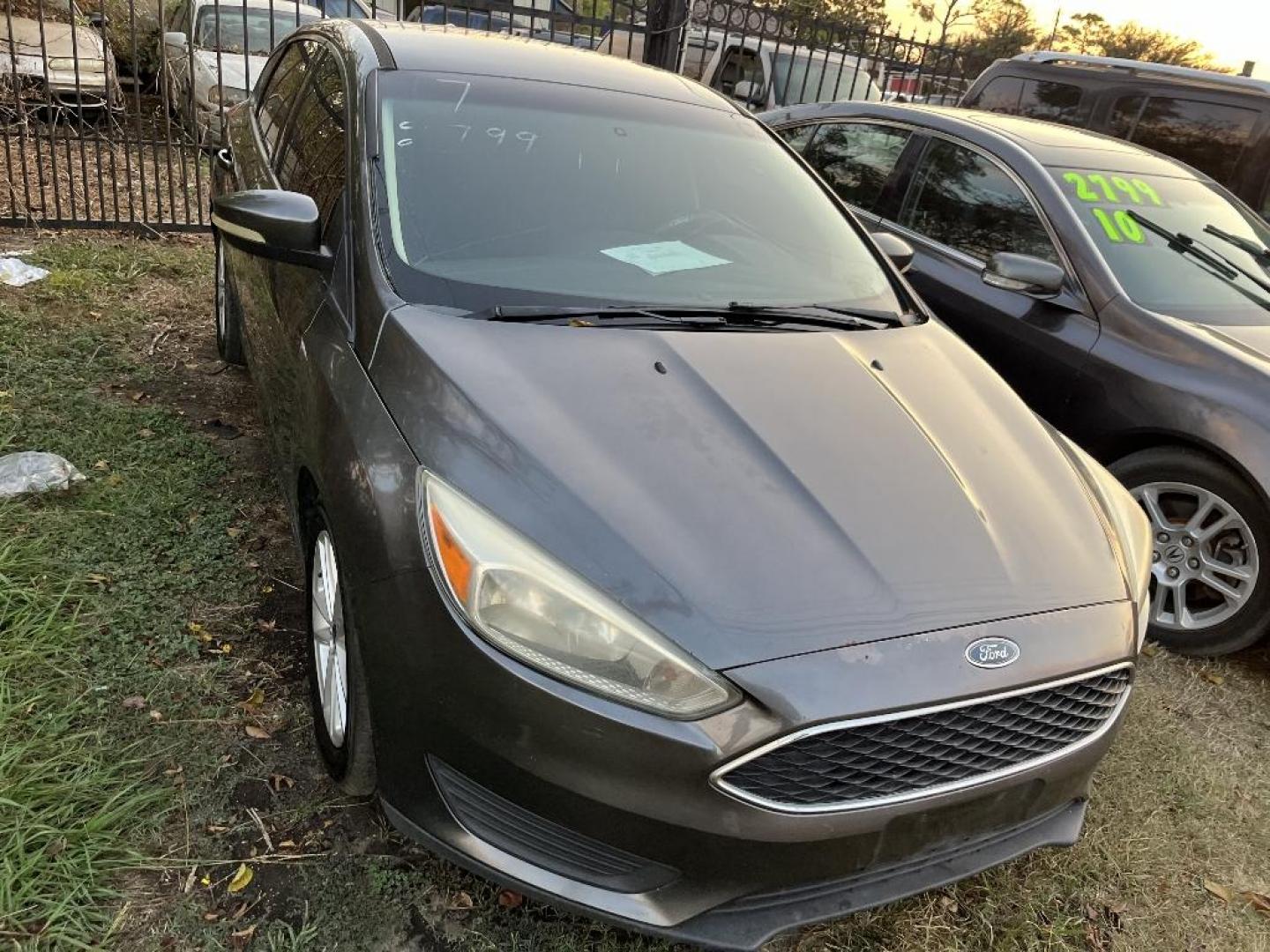 2017 BLACK FORD FOCUS SE Hatch (1FADP3K22HL) with an 2.0L L4 DOHC 16V engine, AUTOMATIC transmission, located at 2303 West Mt. Houston, Houston, 77038, (281) 507-3956, 29.771597, -95.339569 - Photo#2