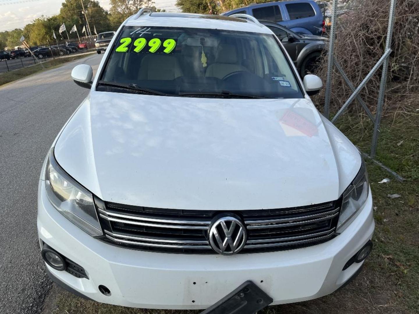 2014 WHITE VOLKSWAGEN TIGUAN S (WVGAV3AX4EW) with an 2.0L L4 DOHC 16V TURBO engine, AUTOMATIC transmission, located at 2303 West Mt. Houston, Houston, 77038, (281) 507-3956, 29.771597, -95.339569 - Photo#0