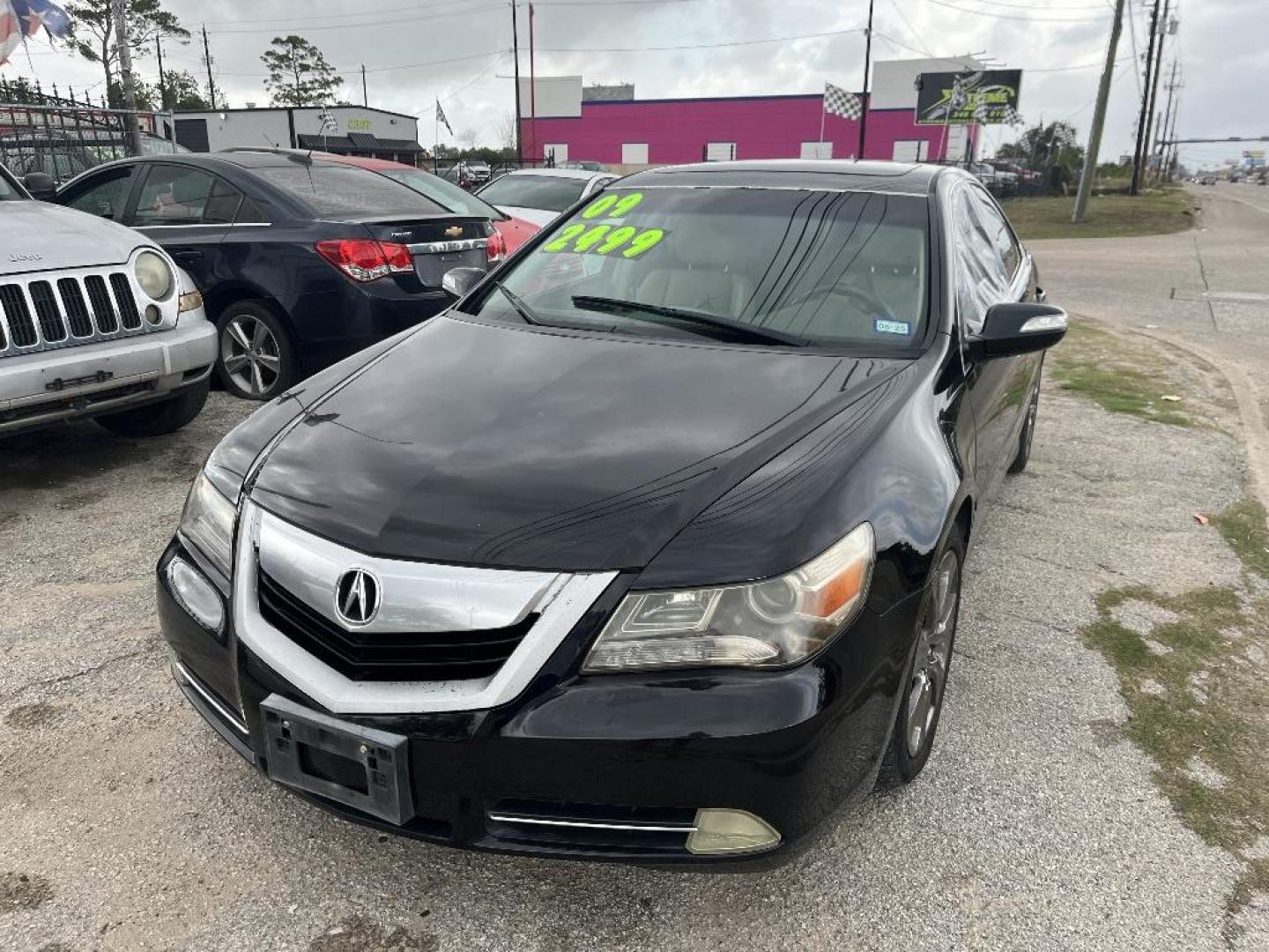 2009 BLACK ACURA RL CMBS/PAX Package (JH4KB26629C) with an 3.5L V6 SOHC 24V engine, AUTOMATIC transmission, located at 2303 West Mt. Houston, Houston, 77038, (281) 507-3956, 29.771597, -95.339569 - Photo#0