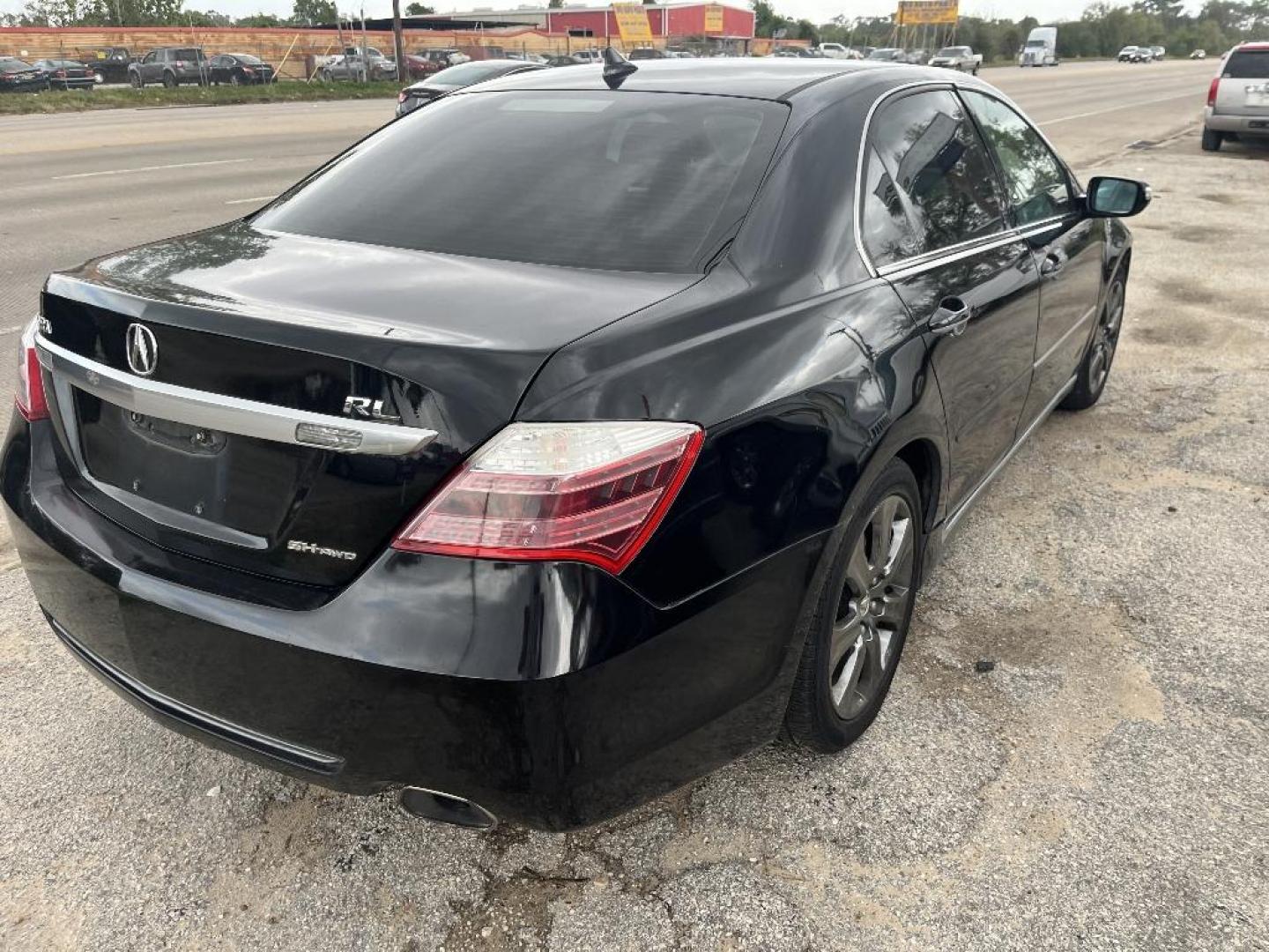 2009 BLACK ACURA RL CMBS/PAX Package (JH4KB26629C) with an 3.5L V6 SOHC 24V engine, AUTOMATIC transmission, located at 2303 West Mt. Houston, Houston, 77038, (281) 507-3956, 29.771597, -95.339569 - Photo#1