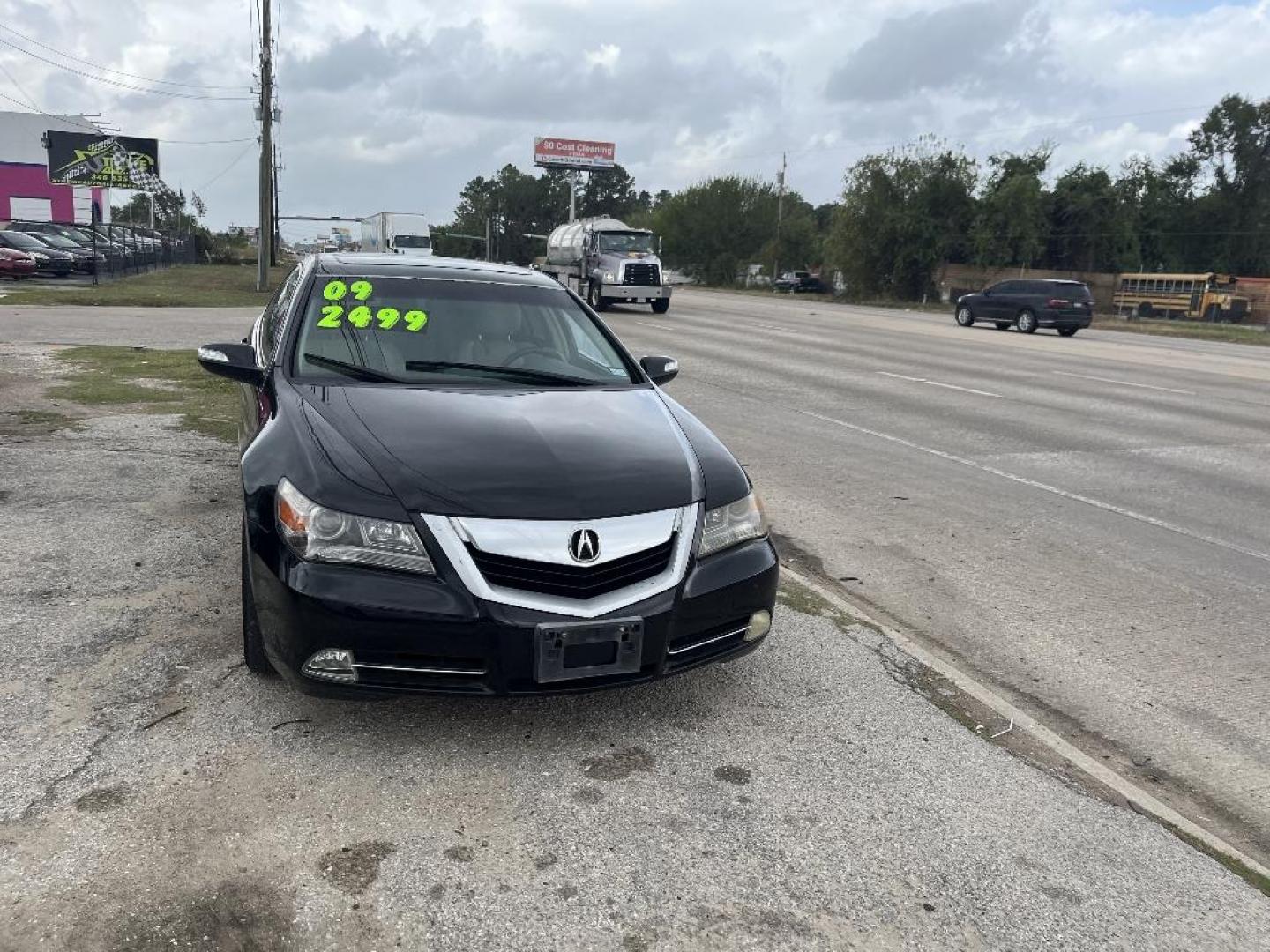 2009 BLACK ACURA RL CMBS/PAX Package (JH4KB26629C) with an 3.5L V6 SOHC 24V engine, AUTOMATIC transmission, located at 2303 West Mt. Houston, Houston, 77038, (281) 507-3956, 29.771597, -95.339569 - Photo#4