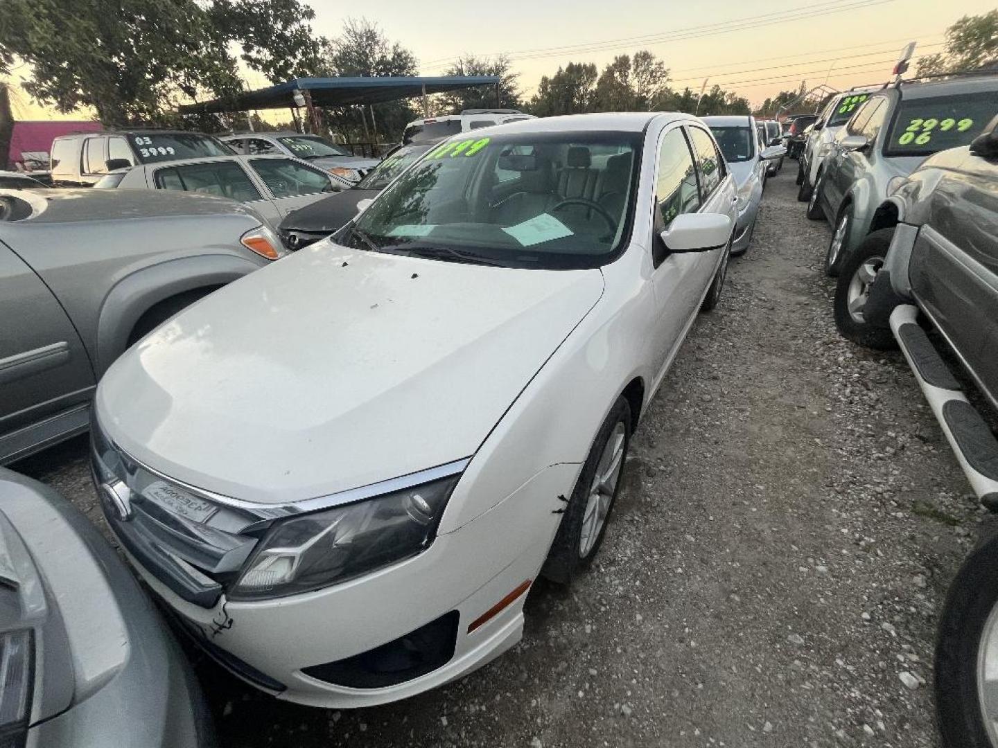 2012 WHITE FORD FUSION SEL (3FAHP0JG1CR) with an 3.0L V6 DOHC 24V engine, AUTOMATIC transmission, located at 2303 West Mt. Houston, Houston, 77038, (281) 507-3956, 29.771597, -95.339569 - Photo#0