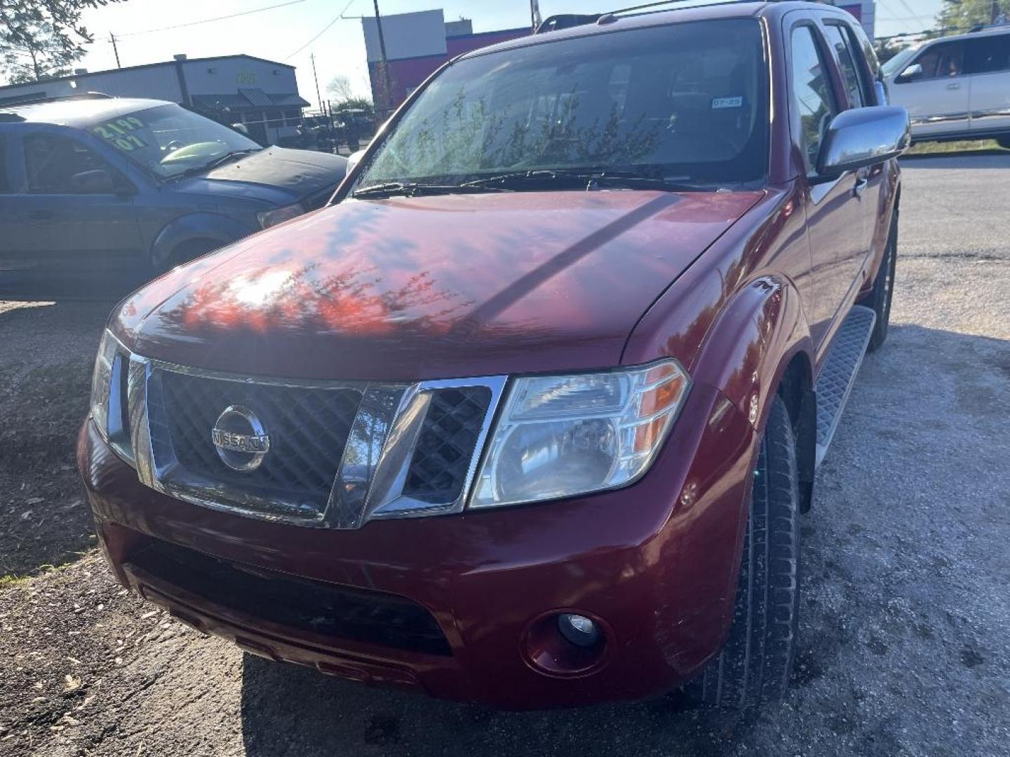 2010 RED NISSAN PATHFINDER LE 2WD (5N1AR1NNXAC) with an 4.0L V6 DOHC 24V engine, AUTOMATIC transmission, located at 2303 West Mt. Houston, Houston, 77038, (281) 507-3956, 29.771597, -95.339569 - Photo#0