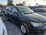 2014 GREEN DODGE JOURNEY SXT (3C4PDCBG5ET) with an 3.6L V6 DOHC 24V engine, AUTOMATIC transmission, located at 2303 West Mt. Houston, Houston, 77038, (281) 507-3956, 29.771597, -95.339569 - Photo#1