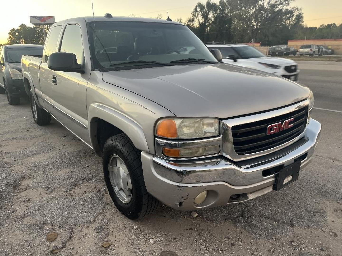 2004 BROWN GMC SIERRA 1500 Work Truck Ext. Cab Short Bed 4WD (2GTEK19T641) with an 5.3L V8 OHV 16V engine, AUTOMATIC transmission, located at 2303 West Mt. Houston, Houston, 77038, (281) 507-3956, 29.771597, -95.339569 - Photo#0