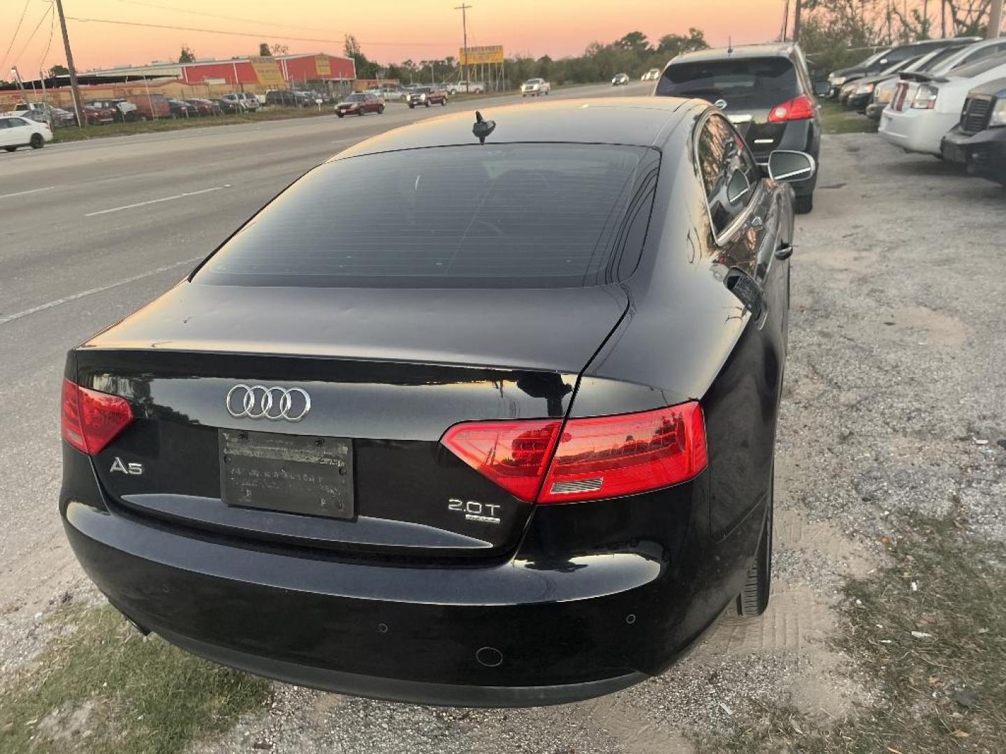 2014 BLACK AUDI A5 Coupe 2.0T quattro Tiptronic (WAULFAFR1EA) with an 2.0L L4 DOHC 16V TURBO engine, AUTOMATIC transmission, located at 2303 West Mt. Houston, Houston, 77038, (281) 507-3956, 29.771597, -95.339569 - Photo#3