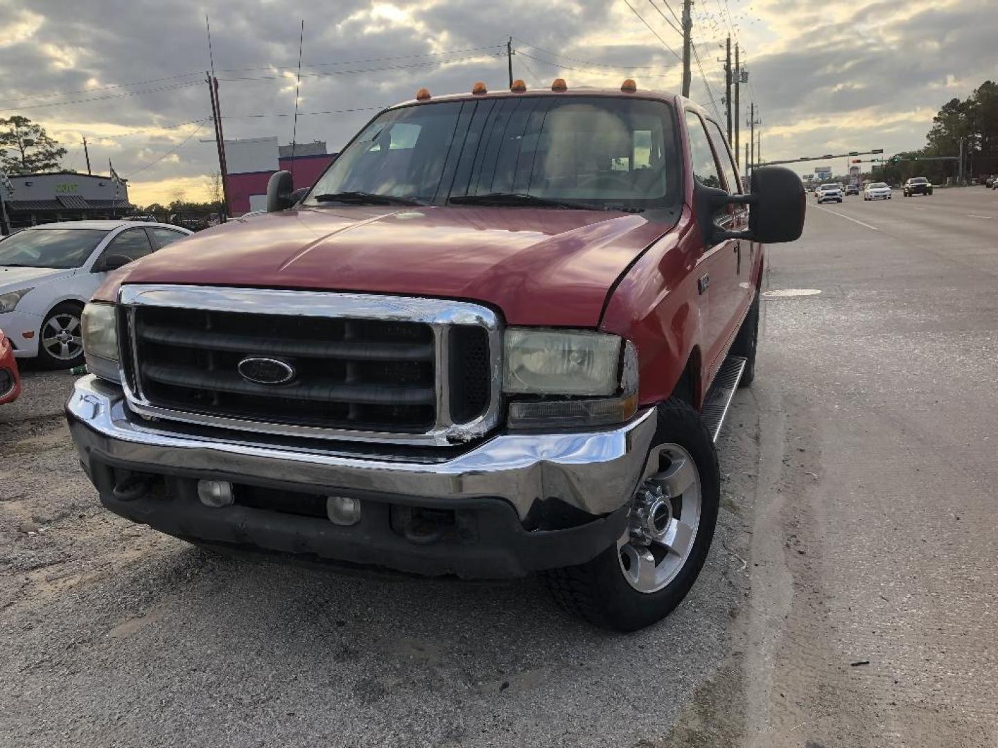 2004 RED FORD F-250 SD XLT Crew Cab 4WD (1FTNW21P34E) with an 6.0L V8 OHV 32V TURBO DIESEL engine, AUTOMATIC transmission, located at 2303 West Mt. Houston, Houston, 77038, (281) 507-3956, 29.771597, -95.339569 - Photo#8