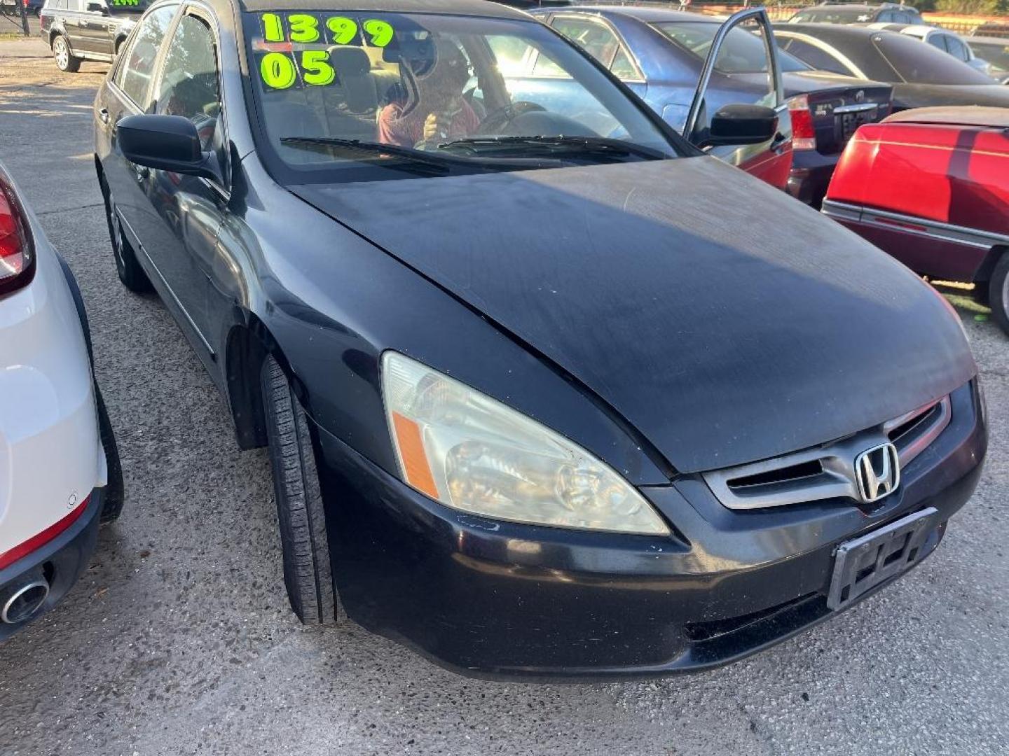 2005 BLACK HONDA ACCORD LX sedan (1HGCM55415A) with an 2.4L L4 DOHC 16V engine, MANUAL transmission, located at 2303 West Mt. Houston, Houston, 77038, (281) 507-3956, 29.771597, -95.339569 - Photo#0