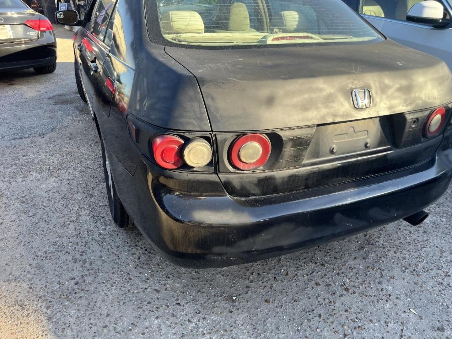 2005 BLACK HONDA ACCORD LX sedan (1HGCM55415A) with an 2.4L L4 DOHC 16V engine, MANUAL transmission, located at 2303 West Mt. Houston, Houston, 77038, (281) 507-3956, 29.771597, -95.339569 - Photo#2