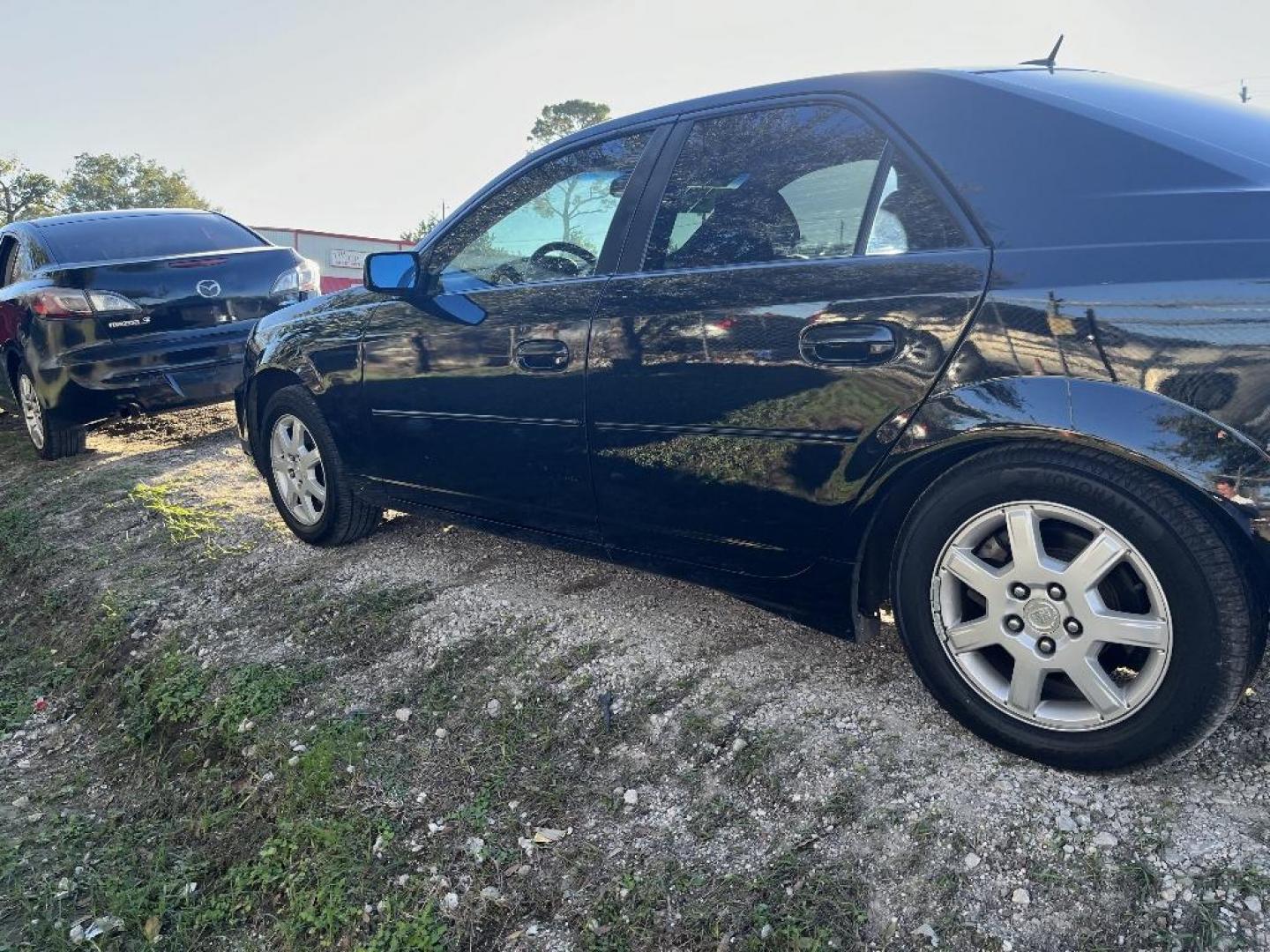 2005 BLACK CADILLAC CTS 3.6L (1G6DP567650) with an 3.6L V6 DOHC 24V engine, AUTOMATIC transmission, located at 2303 West Mt. Houston, Houston, 77038, (281) 507-3956, 29.771597, -95.339569 - Photo#0