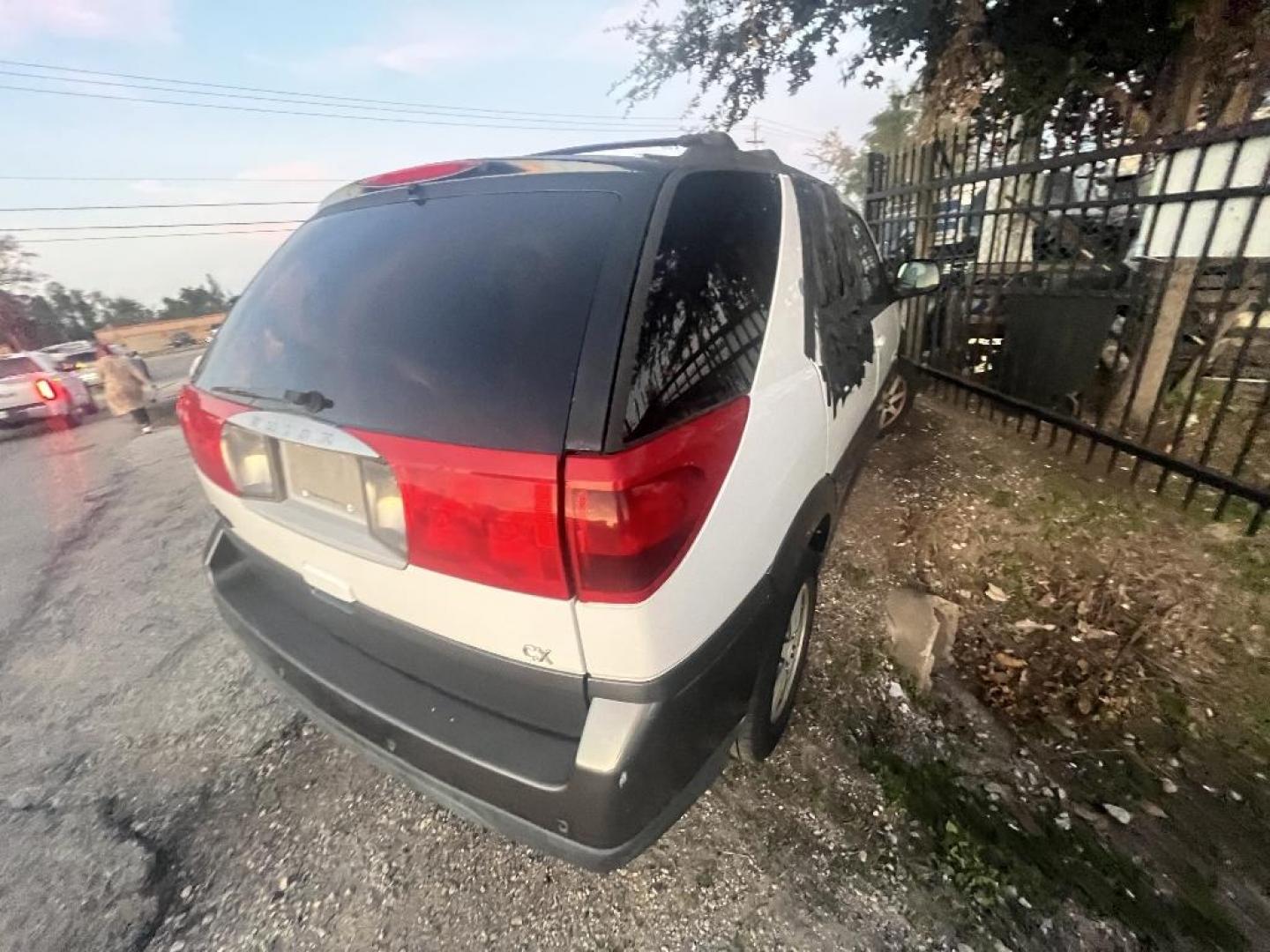 2003 WHITE BUICK RENDEZVOUS CX 2WD (3G5DA03E43S) with an 3.4L V6 OHV 12V engine, AUTOMATIC transmission, located at 2303 West Mt. Houston, Houston, 77038, (281) 507-3956, 29.771597, -95.339569 - Photo#5