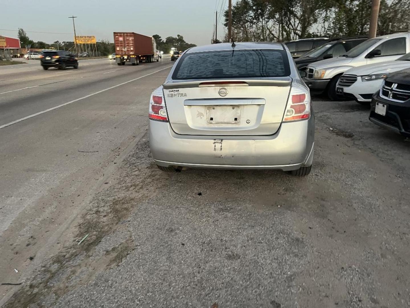 2012 GRAY NISSAN SENTRA 2.0 (3N1AB6AP6CL) with an 2.0L L4 DOHC 16V engine, AUTOMATIC transmission, located at 2303 West Mt. Houston, Houston, 77038, (281) 507-3956, 29.771597, -95.339569 - Photo#5