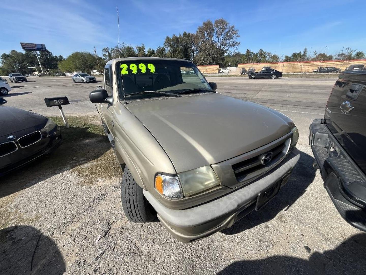 2002 BROWN MAZDA TRUCK B3000 Dual Sport 2WD (4F4YR12U02T) with an 3.0L V6 OHV 16V engine, AUTOMATIC transmission, located at 2303 West Mt. Houston, Houston, 77038, (281) 507-3956, 29.771597, -95.339569 - Photo#0