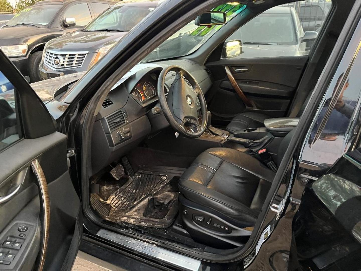 2005 BLACK BMW X3 3.0i (WBXPA93445W) with an 3.0L L6 DOHC 24V engine, AUTOMATIC transmission, located at 2303 West Mt. Houston, Houston, 77038, (281) 507-3956, 29.771597, -95.339569 - Photo#3