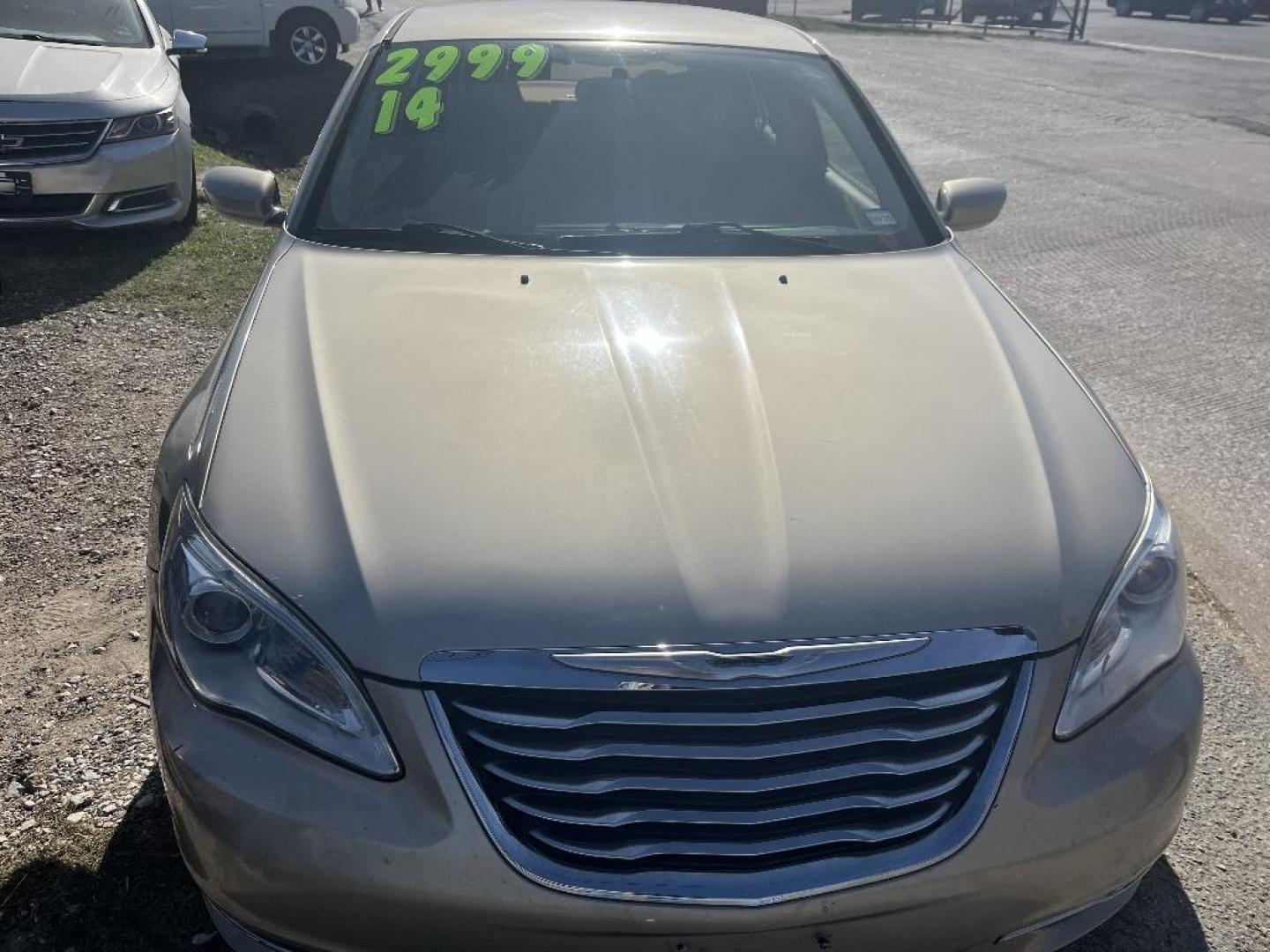 2014 GOLD CHRYSLER 200 Touring (1C3CCBBG2EN) with an 3.6L V6 DOHC 24V FFV engine, AUTOMATIC transmission, located at 2303 West Mt. Houston, Houston, 77038, (281) 507-3956, 29.771597, -95.339569 - Photo#1