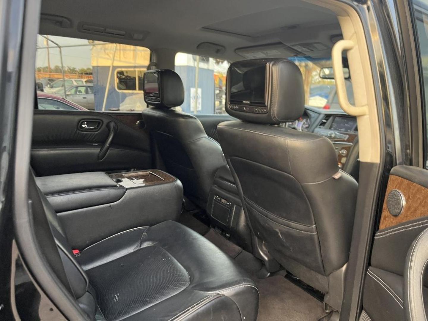 2015 BLACK INFINITI QX80 2WD (JN8AZ2NF9F9) with an 5.6L V8 DOHC 32V engine, AUTOMATIC transmission, located at 2303 West Mt. Houston, Houston, 77038, (281) 507-3956, 29.771597, -95.339569 - Photo#2