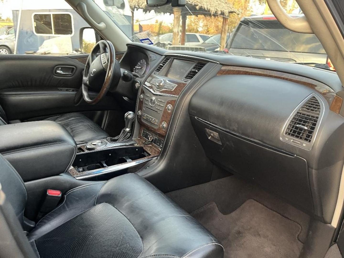 2015 BLACK INFINITI QX80 2WD (JN8AZ2NF9F9) with an 5.6L V8 DOHC 32V engine, AUTOMATIC transmission, located at 2303 West Mt. Houston, Houston, 77038, (281) 507-3956, 29.771597, -95.339569 - Photo#6