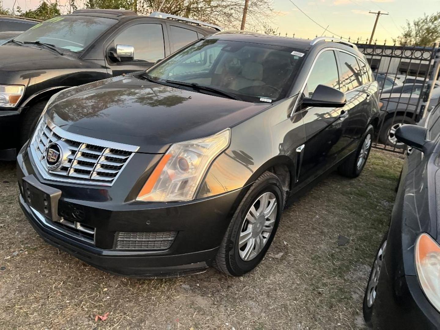 2015 BLUE CADILLAC SRX Luxury Collection FWD (3GYFNBE33FS) with an 3.6L V6 DOHC 24V FFV engine, AUTOMATIC transmission, located at 2303 West Mt. Houston, Houston, 77038, (281) 507-3956, 29.771597, -95.339569 - Photo#1