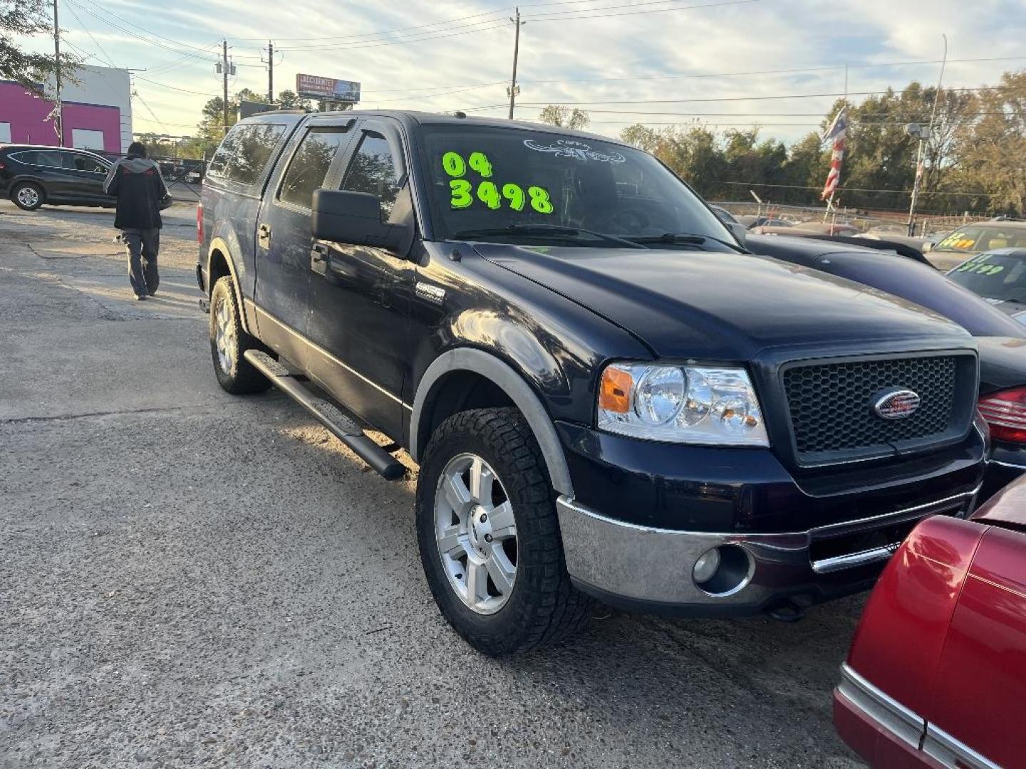 2006 BLUE FORD F-150 FX4 SuperCrew (1FTPW14526F) with an 5.4L V8 SOHC 16V engine, AUTOMATIC transmission, located at 2303 West Mt. Houston, Houston, 77038, (281) 507-3956, 29.771597, -95.339569 - Photo#0