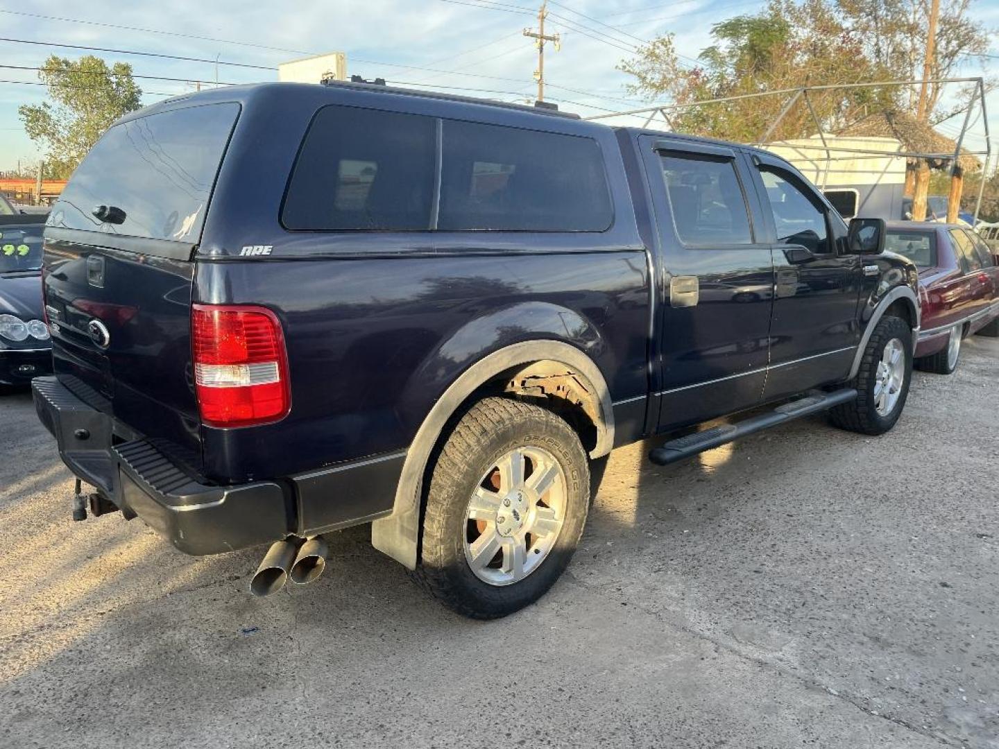 2006 BLUE FORD F-150 FX4 SuperCrew (1FTPW14526F) with an 5.4L V8 SOHC 16V engine, AUTOMATIC transmission, located at 2303 West Mt. Houston, Houston, 77038, (281) 507-3956, 29.771597, -95.339569 - Photo#1