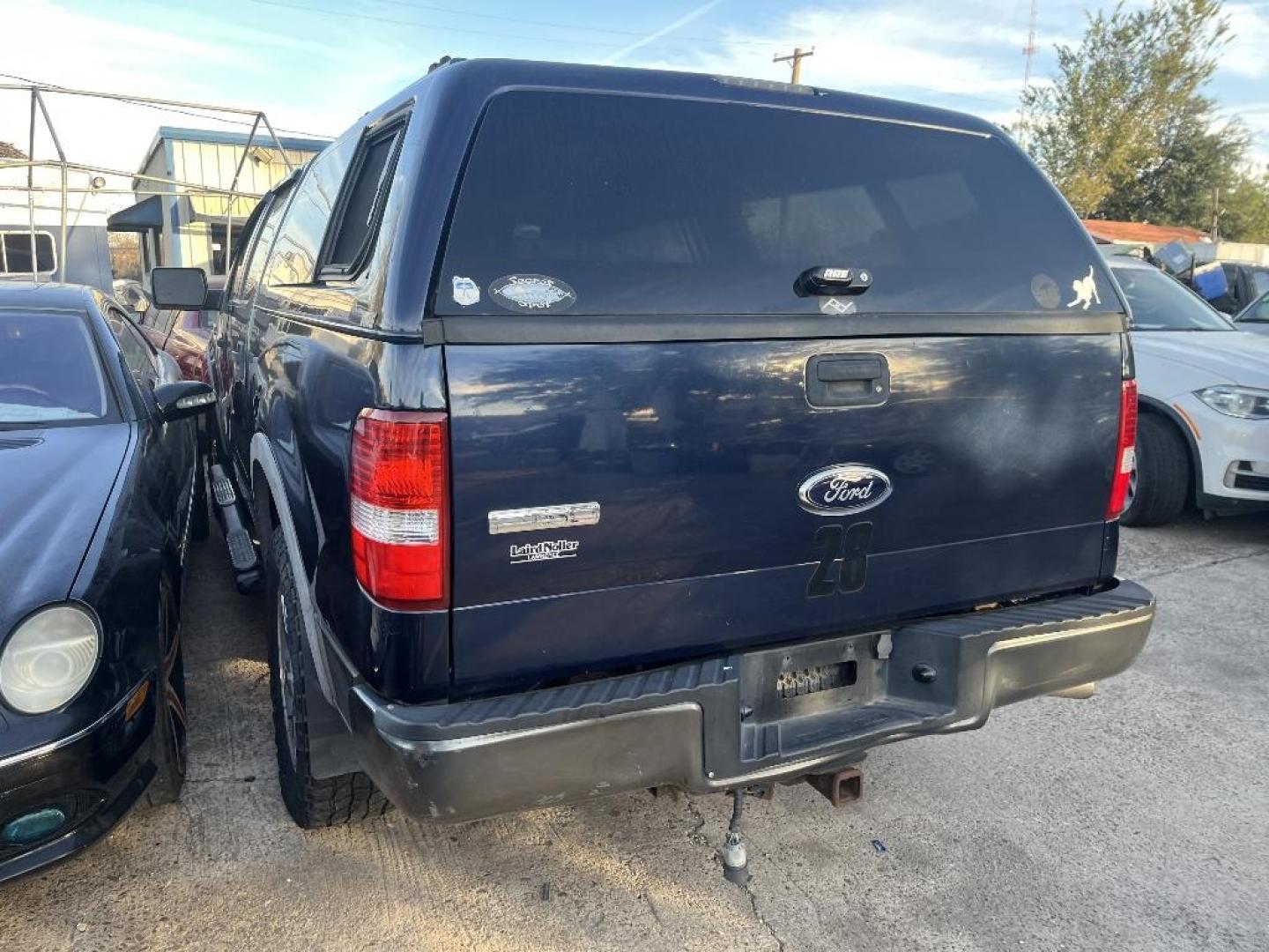 2006 BLUE FORD F-150 FX4 SuperCrew (1FTPW14526F) with an 5.4L V8 SOHC 16V engine, AUTOMATIC transmission, located at 2303 West Mt. Houston, Houston, 77038, (281) 507-3956, 29.771597, -95.339569 - Photo#2