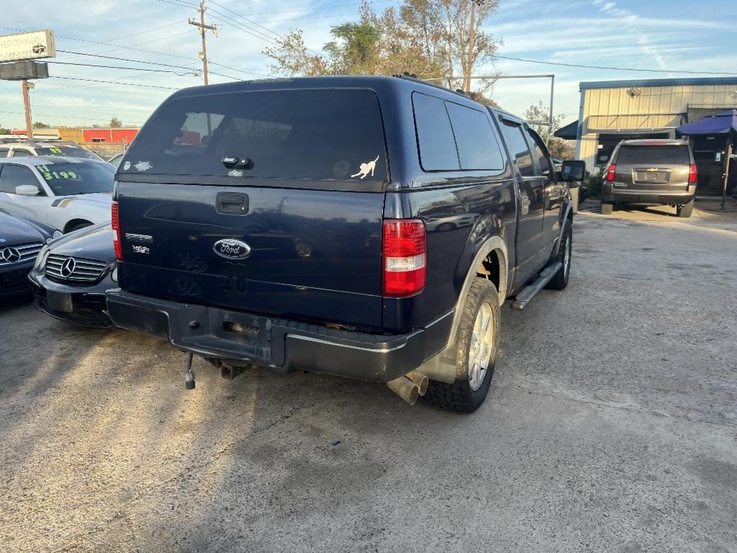 2006 BLUE FORD F-150 FX4 SuperCrew (1FTPW14526F) with an 5.4L V8 SOHC 16V engine, AUTOMATIC transmission, located at 2303 West Mt. Houston, Houston, 77038, (281) 507-3956, 29.771597, -95.339569 - Photo#3