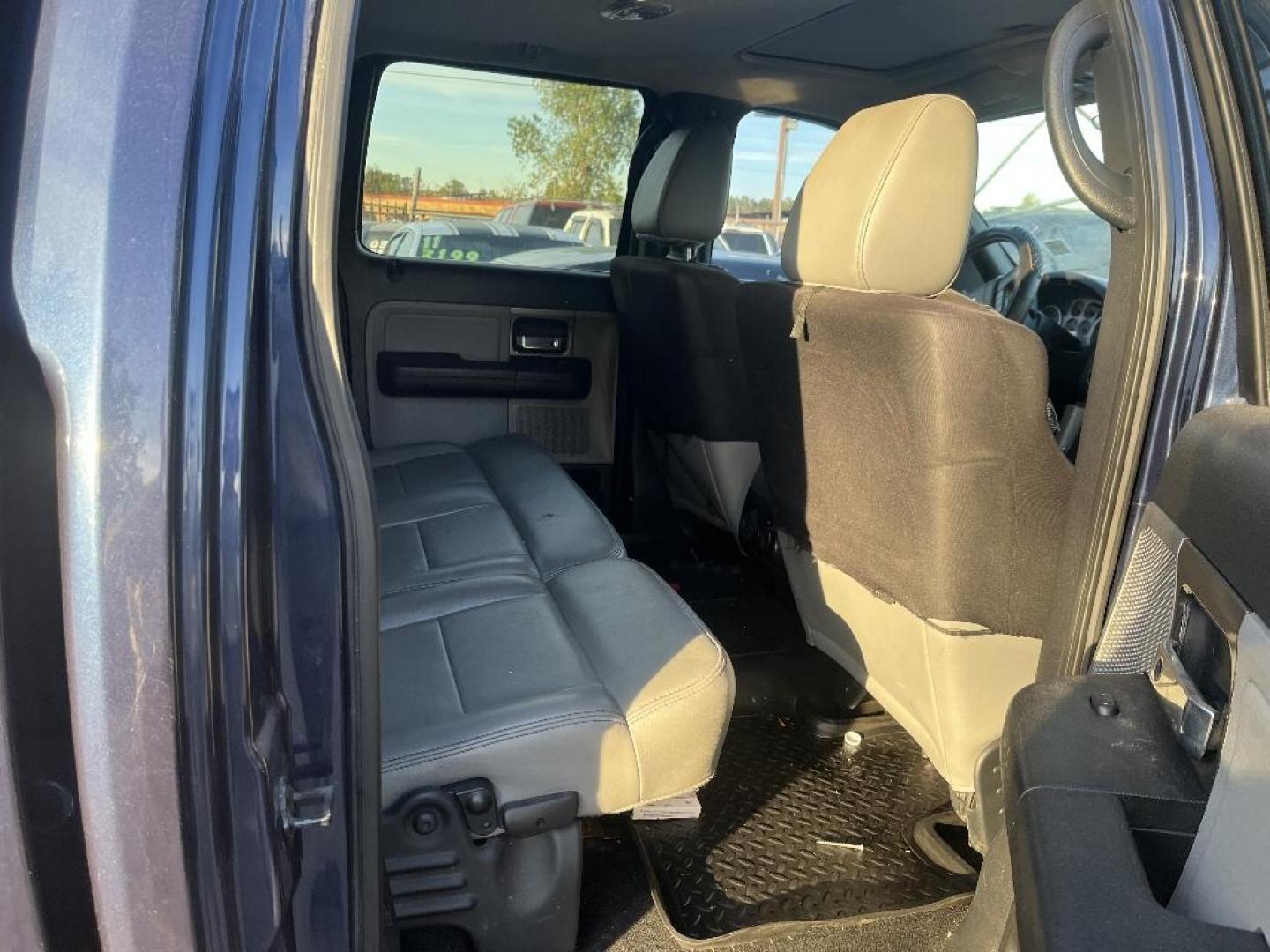 2006 BLUE FORD F-150 FX4 SuperCrew (1FTPW14526F) with an 5.4L V8 SOHC 16V engine, AUTOMATIC transmission, located at 2303 West Mt. Houston, Houston, 77038, (281) 507-3956, 29.771597, -95.339569 - Photo#5