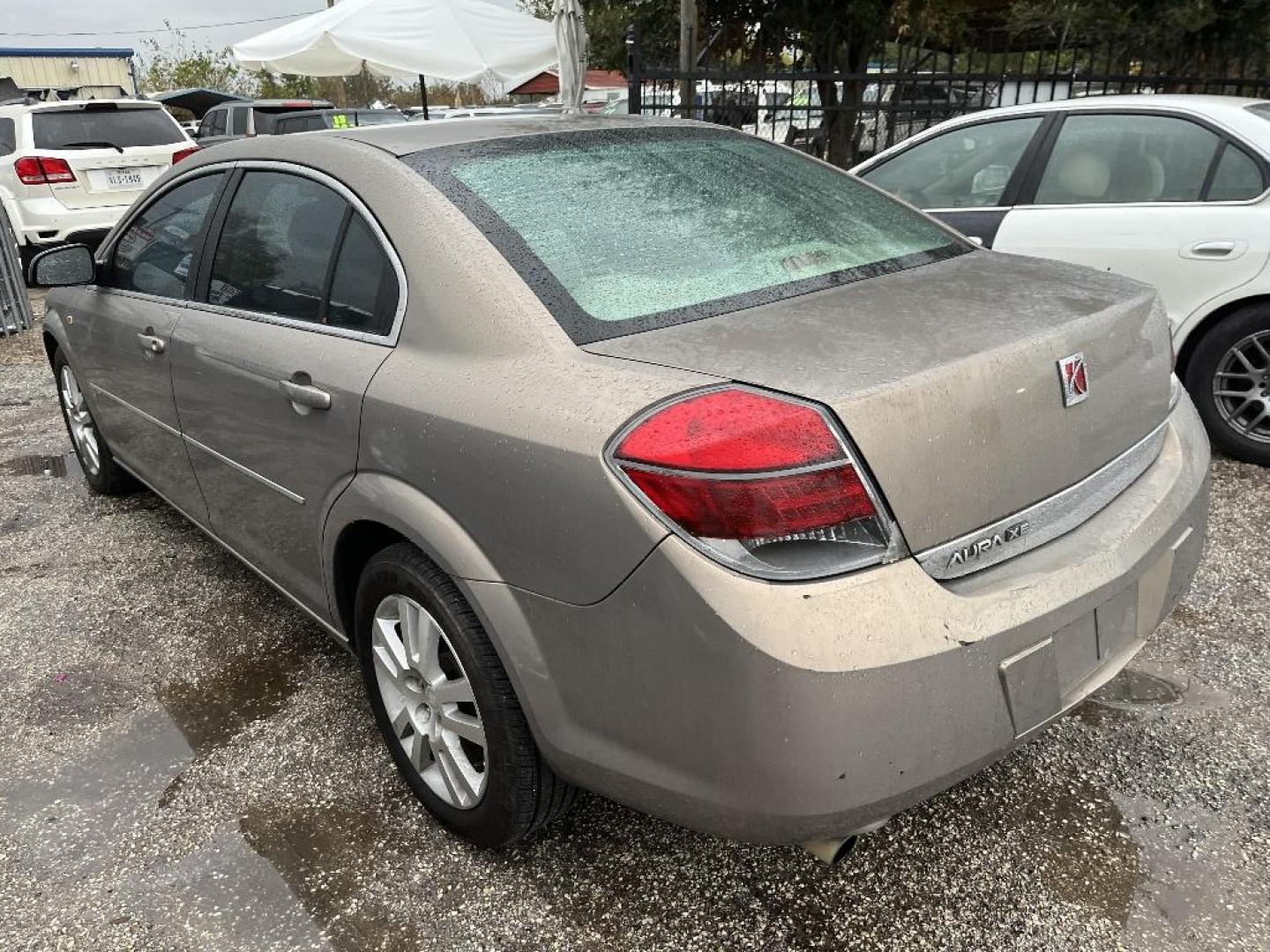 2007 BROWN SATURN AURA XE (1G8ZS57NX7F) with an 3.5L V6 12V OHV engine, AUTOMATIC transmission, located at 2303 West Mt. Houston, Houston, 77038, (281) 507-3956, 29.771597, -95.339569 - Photo#1