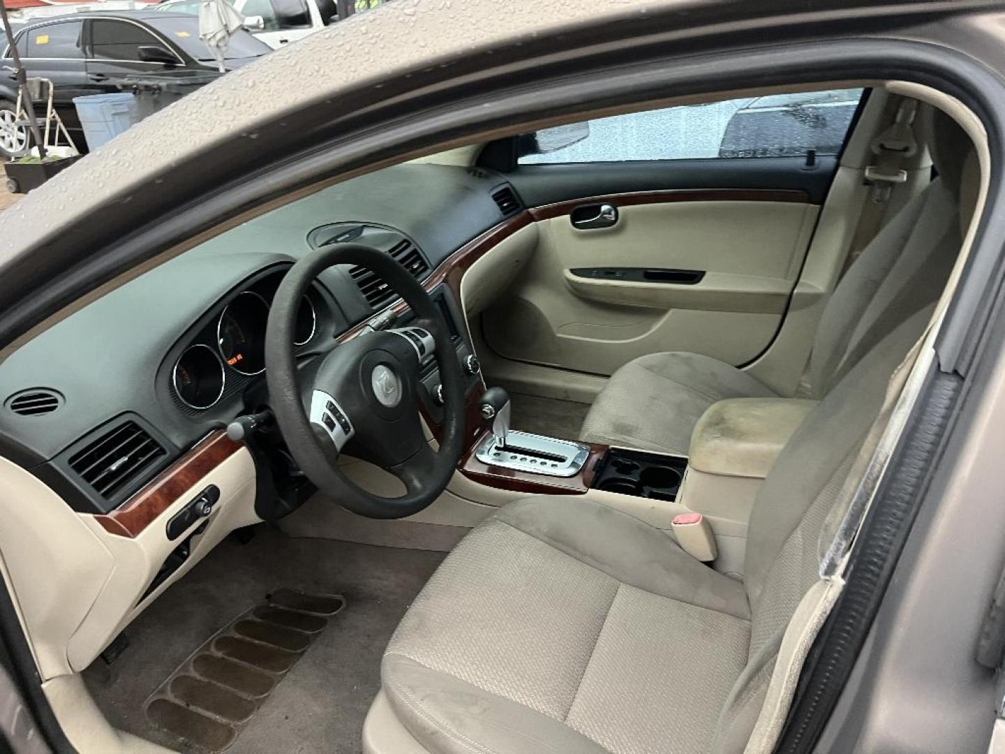 2007 BROWN SATURN AURA XE (1G8ZS57NX7F) with an 3.5L V6 12V OHV engine, AUTOMATIC transmission, located at 2303 West Mt. Houston, Houston, 77038, (281) 507-3956, 29.771597, -95.339569 - Photo#3