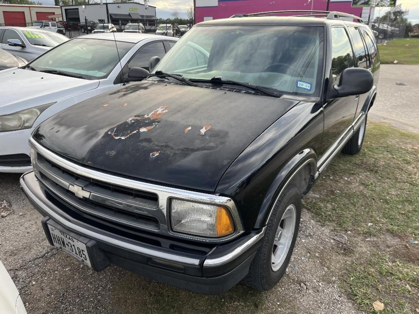 1997 BLACK CHEVROLET BLAZER 4-Door 2WD (1GNCS13W4V2) with an 4.3L V6 OHV 12V engine, AUTOMATIC transmission, located at 2303 West Mt. Houston, Houston, 77038, (281) 507-3956, 29.771597, -95.339569 - Photo#0